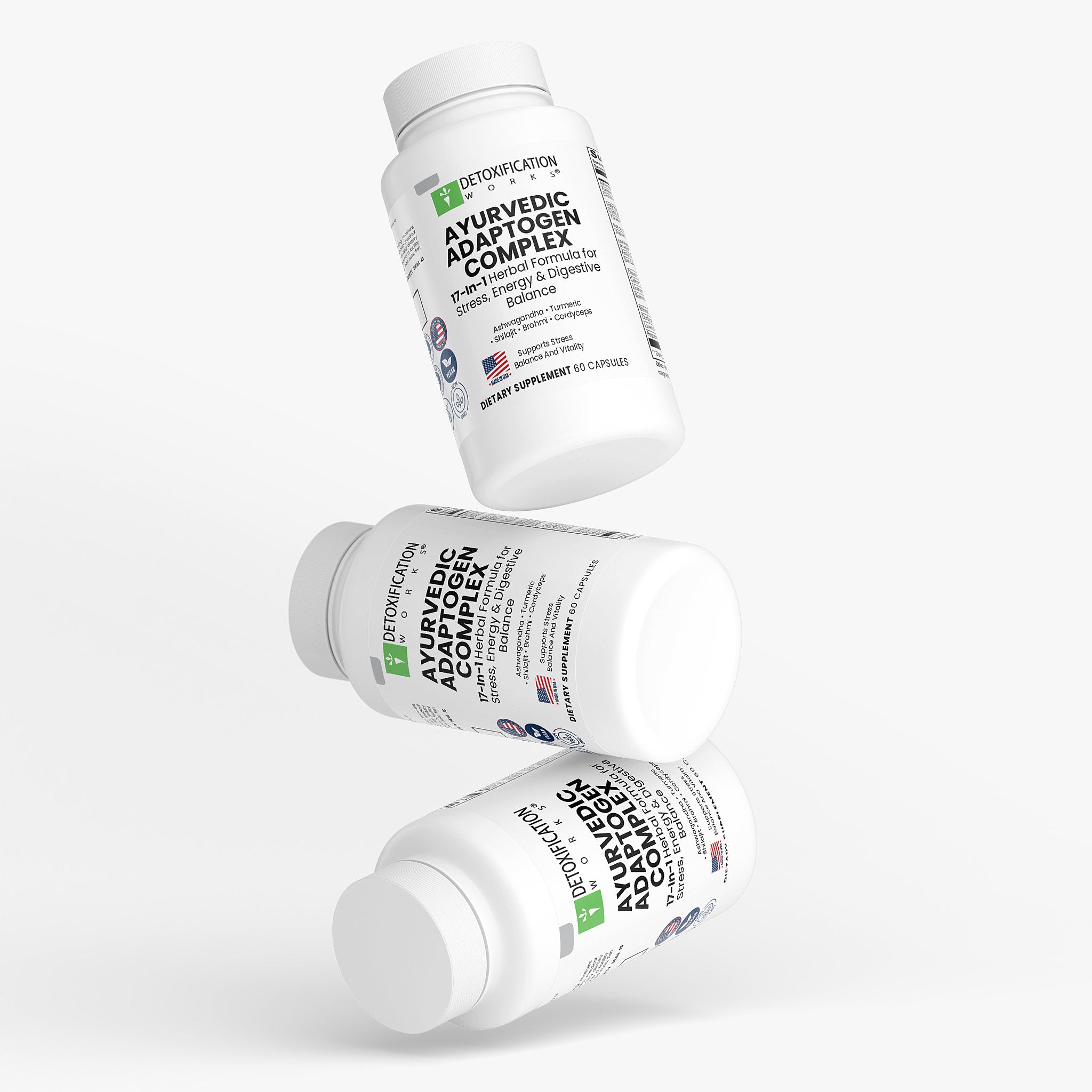 Three bottles of Ayurvedic Adaptogen Complex on a white background